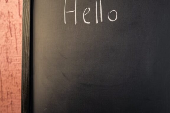 a greeting on a chalkboard